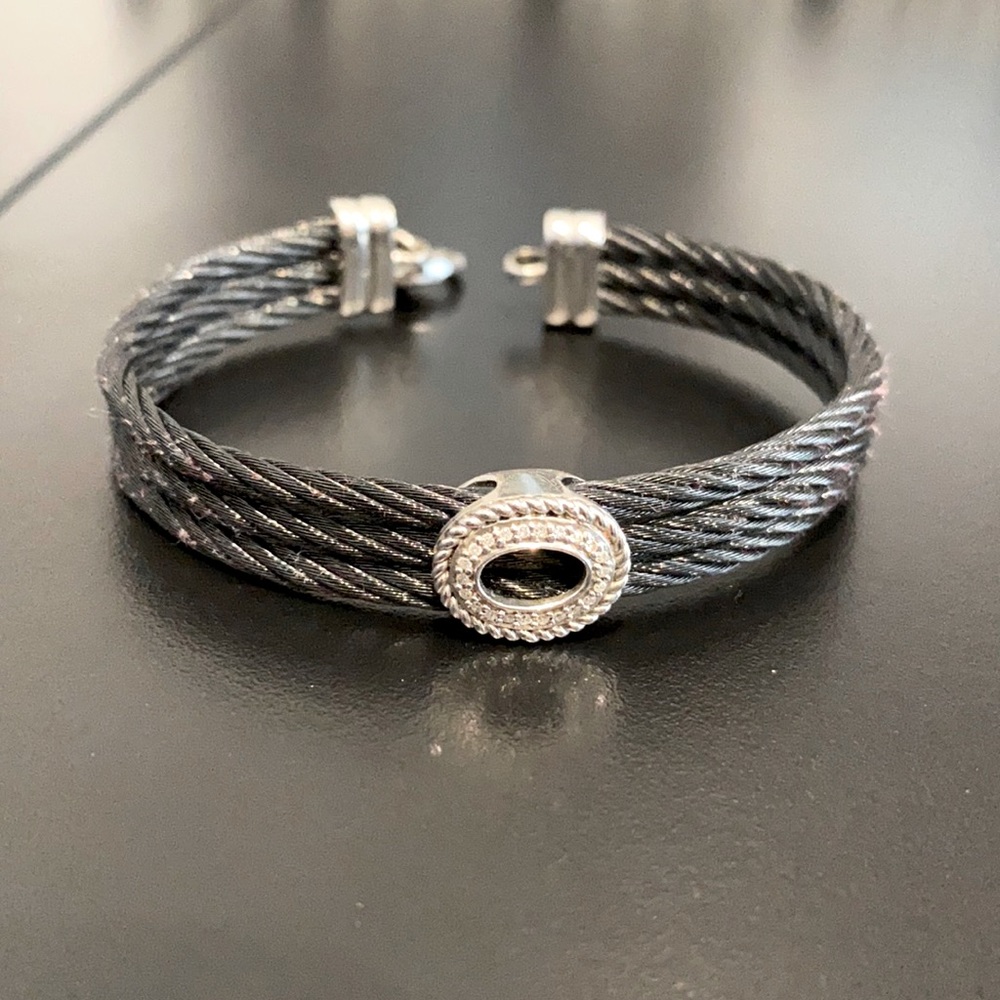 Black cable bracelet with round pave crystals.